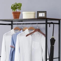 Garment Heavy-Duty Coat Rack Black Metal Freestanding 2 Storage Baskets for Bedroom, Cloakroom, Clothing Store, Etc. by VECELO 19 Garment Heavy-Duty Coat Rack Black Metal Freestanding 2 Storage Baskets for Bedroom, Cloakroom, Clothing Store, Etc. by VECELO -Camaflexi Shop black vecelo coat racks khd xf chr01 brn 31 1000